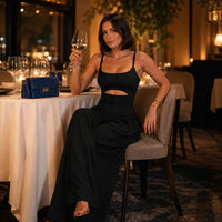 JUMPLORA – Sleeveless Wide Leg Jumpsuit with Adjustable Back Tie Detail