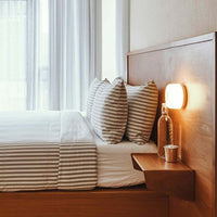 ILLUMINEX - Designer Dimple Glass LED Wall Sconce for Modern Interiors