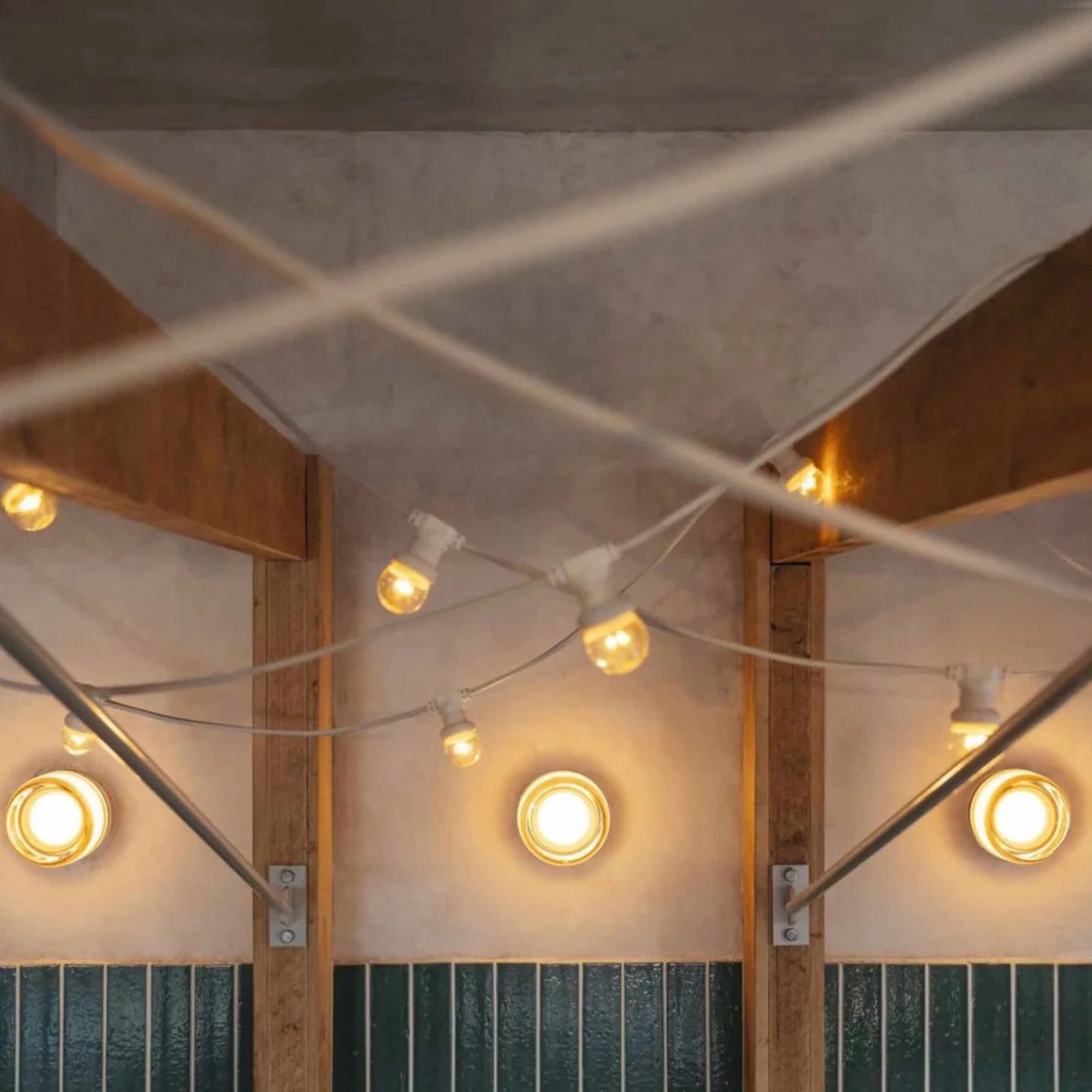 ILLUMINEX - Designer Dimple Glass LED Wall Sconce for Modern Interiors