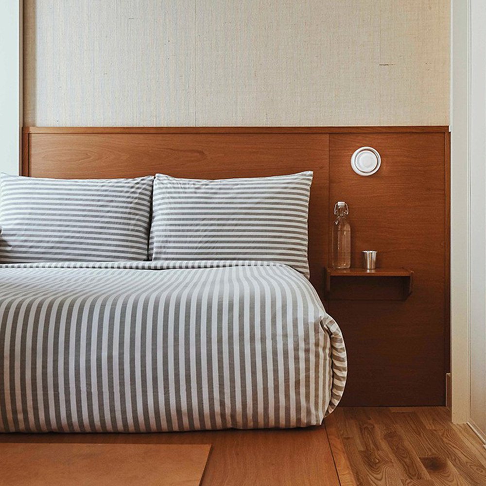 ILLUMINEX - Designer Dimple Glass LED Wall Sconce for Modern Interiors