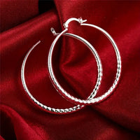 SPARKLUXE – Hoop Earrings for Timeless Shine and Sophistication