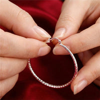 SPARKLUXE – Hoop Earrings for Timeless Shine and Sophistication